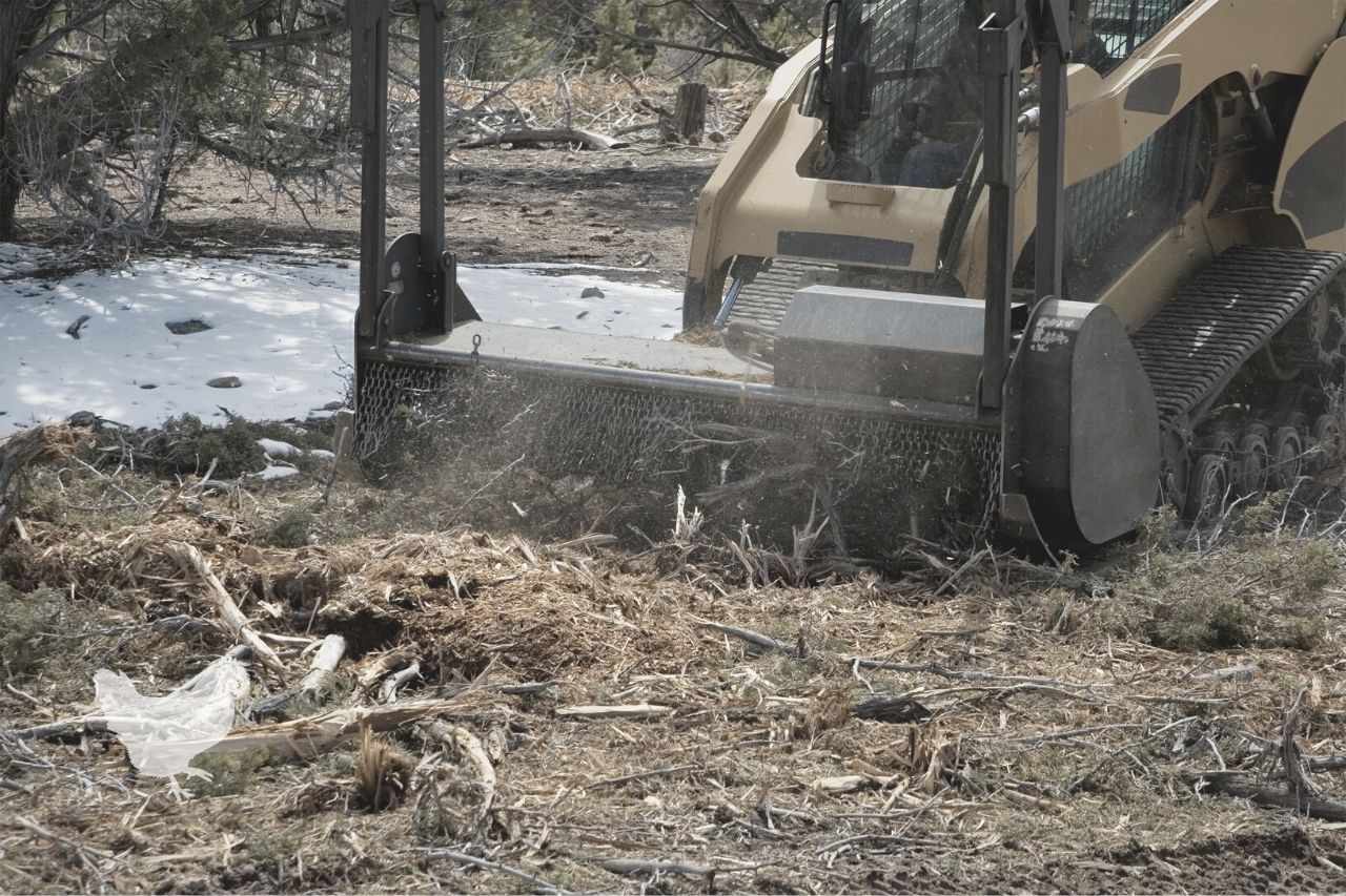 how to get a bobcat stuck in mud unstuck